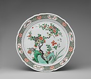 Dish with rocks, flowers, and birds