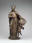 Saint Ignatius Loyola with an Angel Holding a Book Inscribed with the Motto of the Society of Jesus