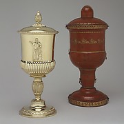 Cup with cover with a leather case