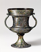 Olive glass cup with iridescent effect