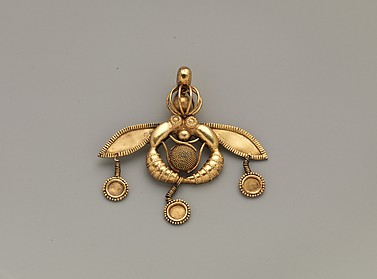 Reproduction of a gold bee pendant