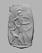 Terracotta relief of a warrior dragging a captive