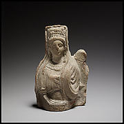 Terracotta statuette of a seated goddess
