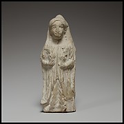 Standing female figurine