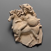 Terracotta relief of a horseman