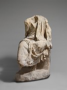 Marble statue of a draped seated man