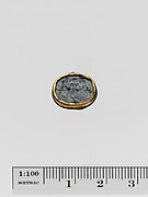 Plasma scaraboid seal set in a gold band