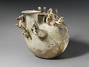 Terracotta askos (flask with a handle over the top)
