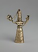 Reproduction of a fake gold snake goddess statuette