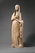 Limestone statue of a veiled female votary