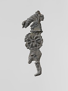 Lead figure of a warrior with a helmet and shield