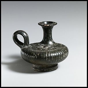 Terracotta guttus (flask with handle and vertical spout) with a depiction of a dog