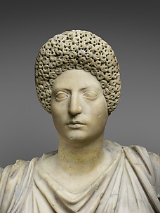 Marble statue of Tyche-Fortuna restored with the portrait head of a woman