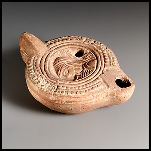Terracotta oil lamp