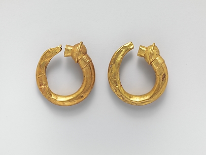 Gold trumpet-shaped earrings