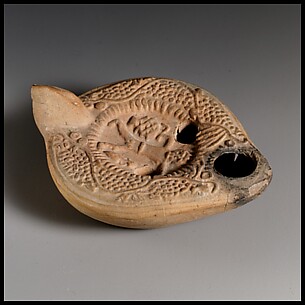 Terracotta oil lamp