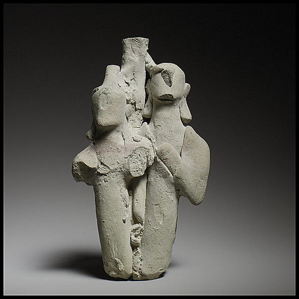 Group of three standing male figures