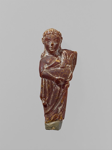 Pendant: woman carrying a child
