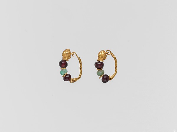 Gold earring with woman's head and beryl and garnet beads