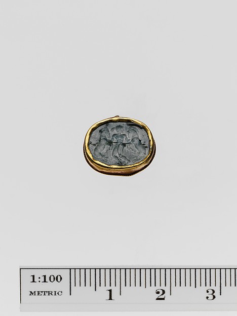Plasma scaraboid seal set in a gold band