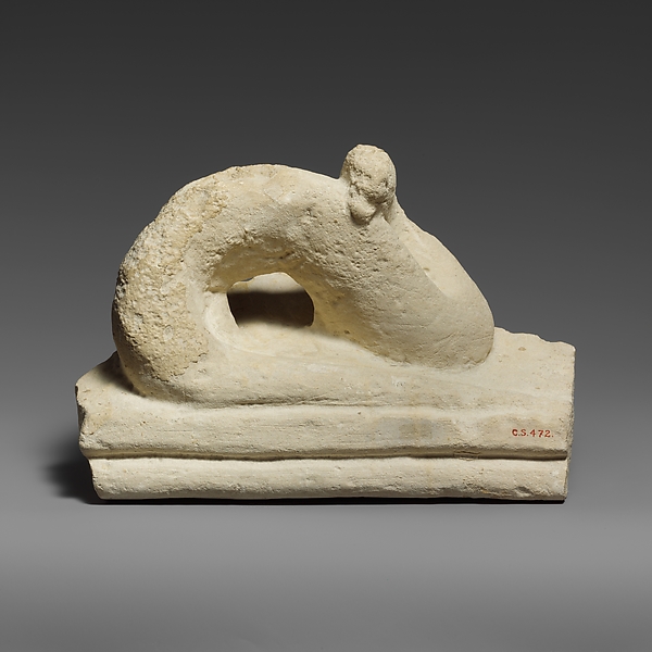 Two fragments of a limestone sarcophagus lid with snakes