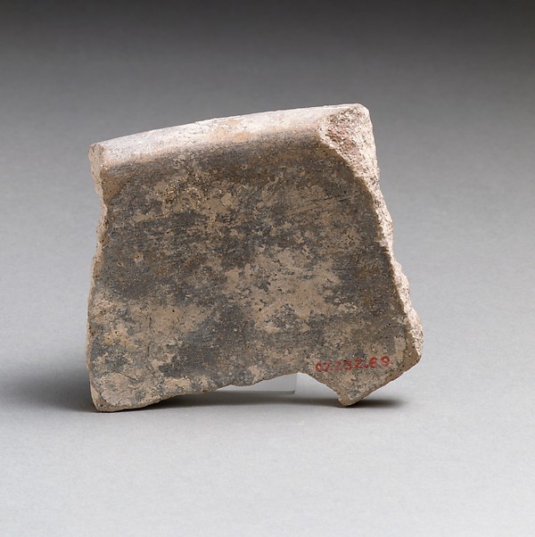 Terracotta rim fragment with cross-hatching