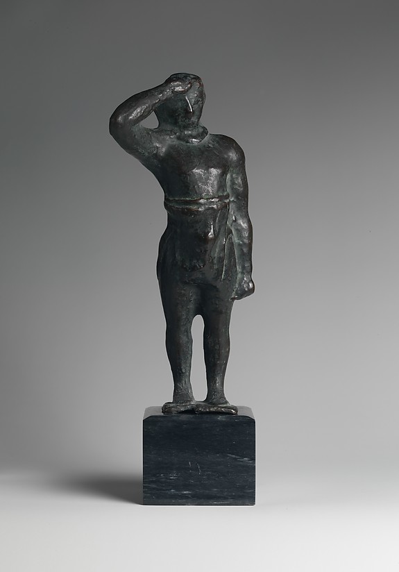 Reproduction of a bronze statuette of a man