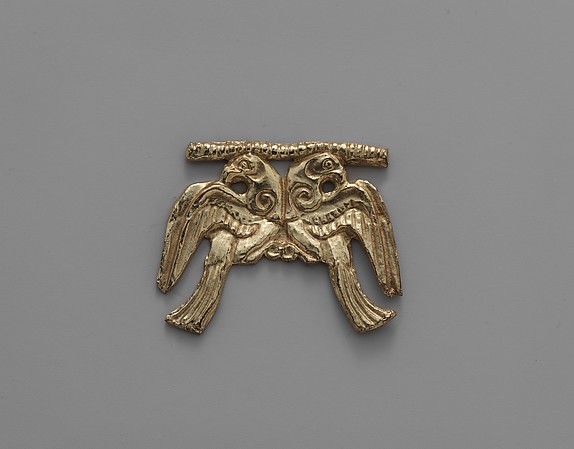 Reproduction of a gold double eagle pendant