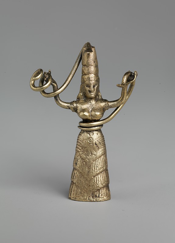 Reproduction of a fake gold snake goddess statuette