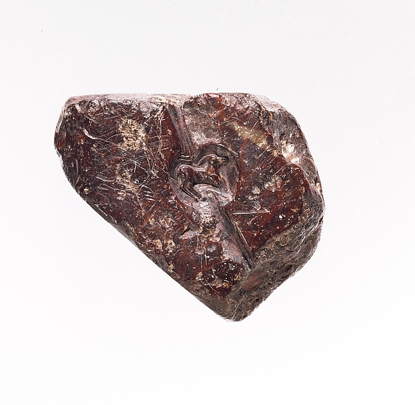 Steatite block with intaglio motifs