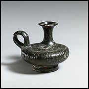 Terracotta guttus (flask with handle and vertical spout) with a depiction of a dog
