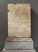 Marble inscribed statue base