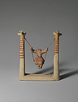 Reproduction of a terracotta figure of a girl on a swing