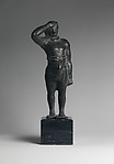 Reproduction of a bronze statuette of a man