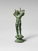 Bronze statuette of a youth carrying a pig