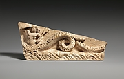 Limestone pediment fragment