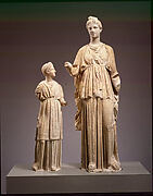 Marble funerary statues of a maiden and a little girl