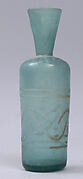 Bottle with cut design