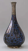 Bottle Depicting a Peacock in Foliage