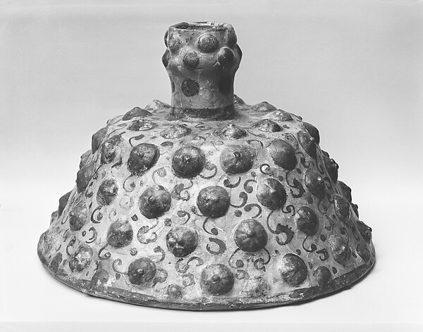 A Candlestick and a Lamp