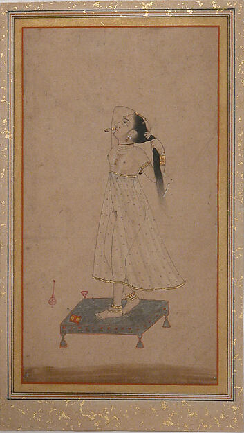 Lady Dressing Her Hair