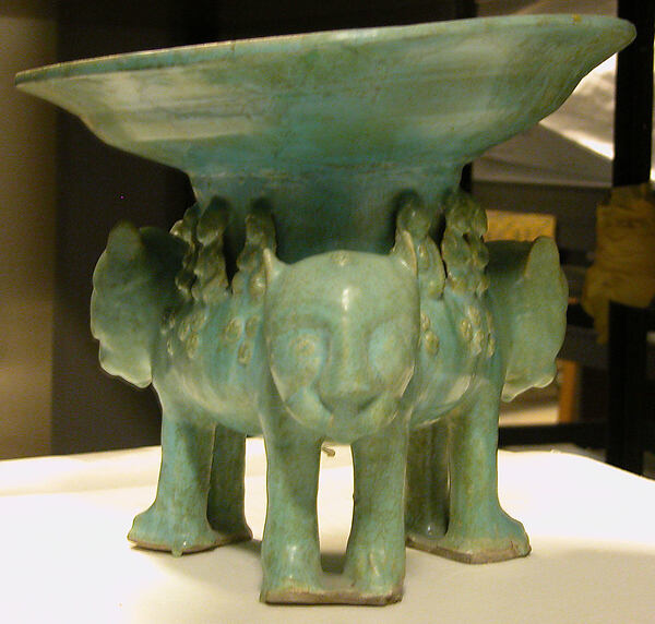 Bowl on a Base of Three Molded Lions