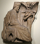 Fragment of a Sarcophagus with a Seated Figure