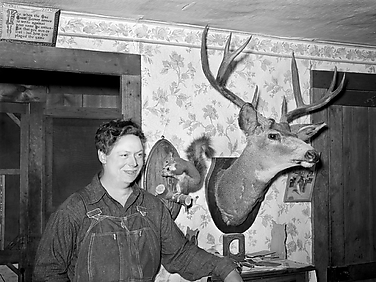 Mildred Anthony, Standing by Mounted Animals Which She Killed