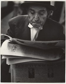 [Man Reading Yiddish Newspaper]