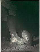 Wes Fesler Kicking a Football