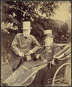 [Two Gentlemen, One in Cart]