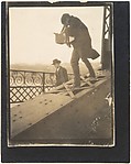 [Alfred Stieglitz Photographing on a Bridge]