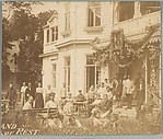 [Group on Lawn and Benches Before House, Possibly Sanatorium]