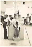 [Man at Communal Laundry in Courtyard, Havana]